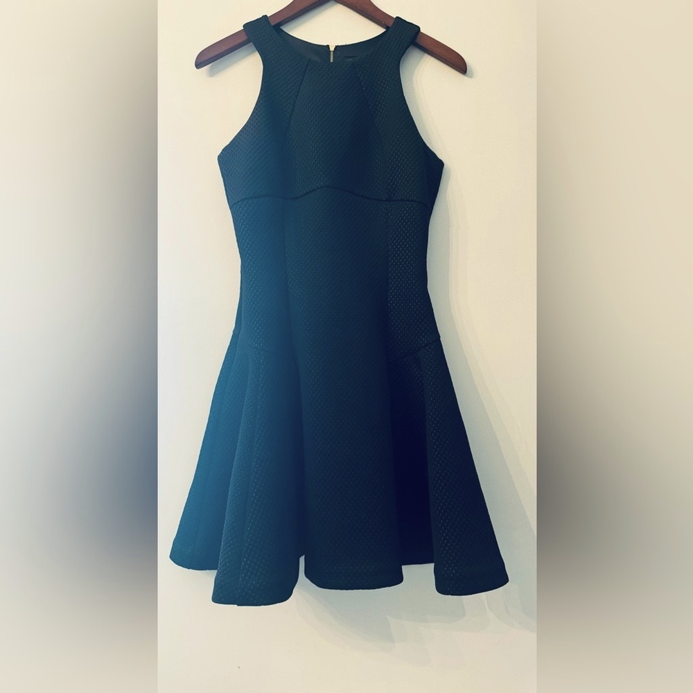 Ted Baker size 4 black halter fitted bodice and voluminous skirt.